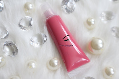 Strawberry Dream is a gorgeous pink hydrating gloss that smells just like her name. This gloss is also vegan, gluten-free, high shine, smooth and long lasting. It's made with premium rich ingredients to keep your lips soft, moisturized and luscious without feeling sticky. Strawberry Dream is available in a squeeze tube and a wand tube (doe foot applicator) for a more precise application.