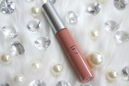 Barely There is a gorgeous nude pink with touch of brown hydrating gloss. This gloss is also vegan, gluten-free, high shine, smooth and long lasting. It's made with premium rich ingredients to keep your lips soft, moisturized and luscious without feeling sticky. Barely There is available in a squeeze tube and a wand tube (doe foot applicator) for a more precise application.