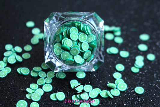 These Lime Fruit Slices are PERFECT for 3D nail or body art. They can also be used for a DIY craft project. The fruit slices are made of polymer clay and are approximately 3mm/0.12 inch in size. Note: Lime Fruit Slices are not recommended for use in the immediate eye area. Tip: Apply some of our glitter to your nails to really GLAMOUREYES your look.