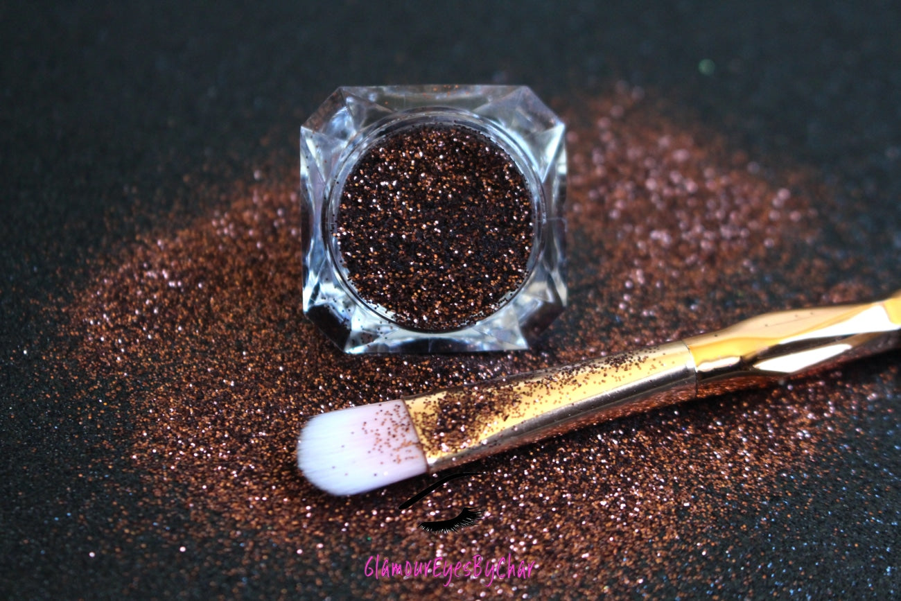 This glitter is called Melanin and is part of the simple glitter collection. It consists of chocolate brown metallic extra fine glitter.  Melanin can be used for your face, body, hair and nails. Comes in 5g jars only. 