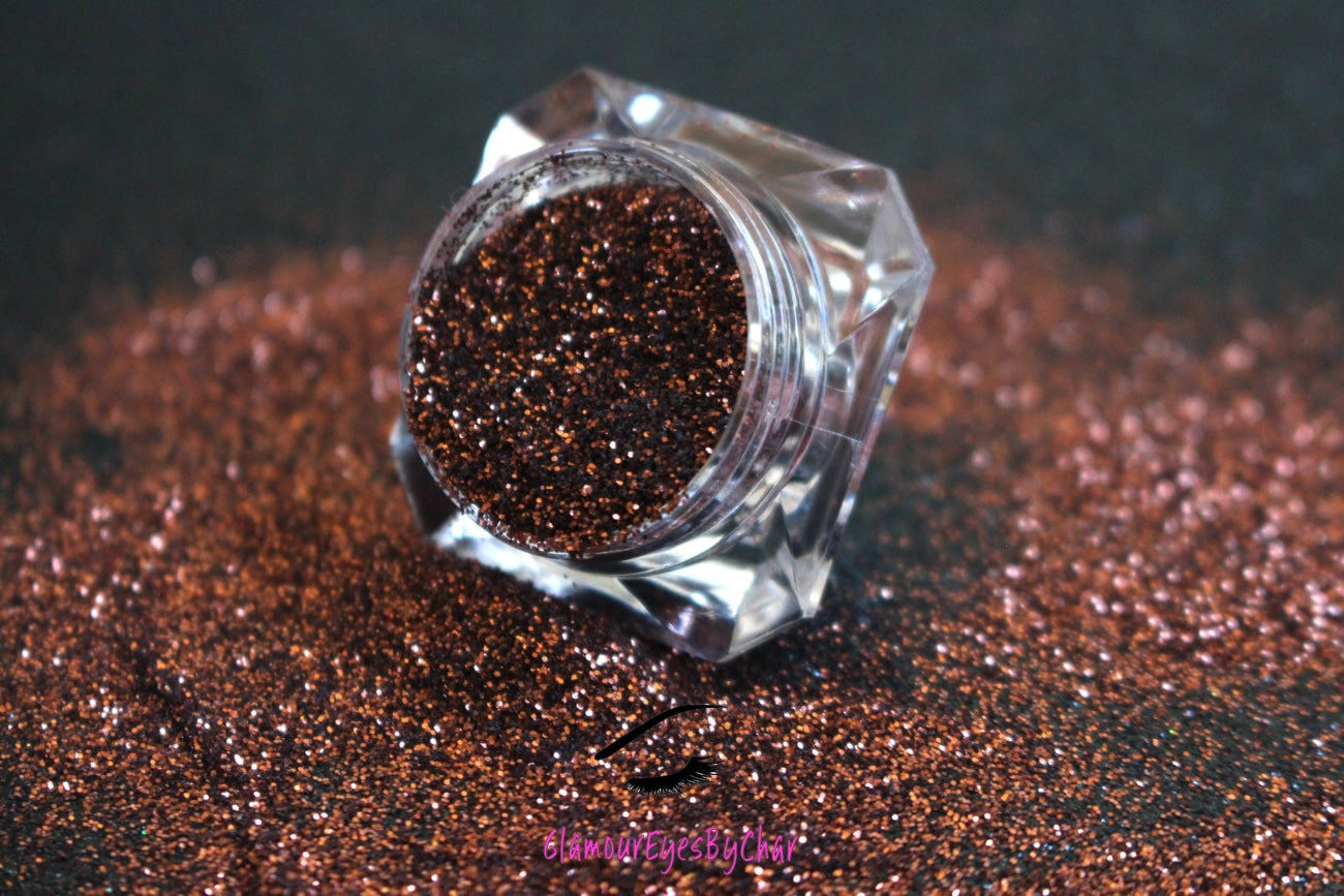 This glitter is called Melanin and is part of the simple glitter collection. It consists of chocolate brown metallic extra fine glitter.  Melanin can be used for your face, body, hair and nails. Comes in 5g jars only. 