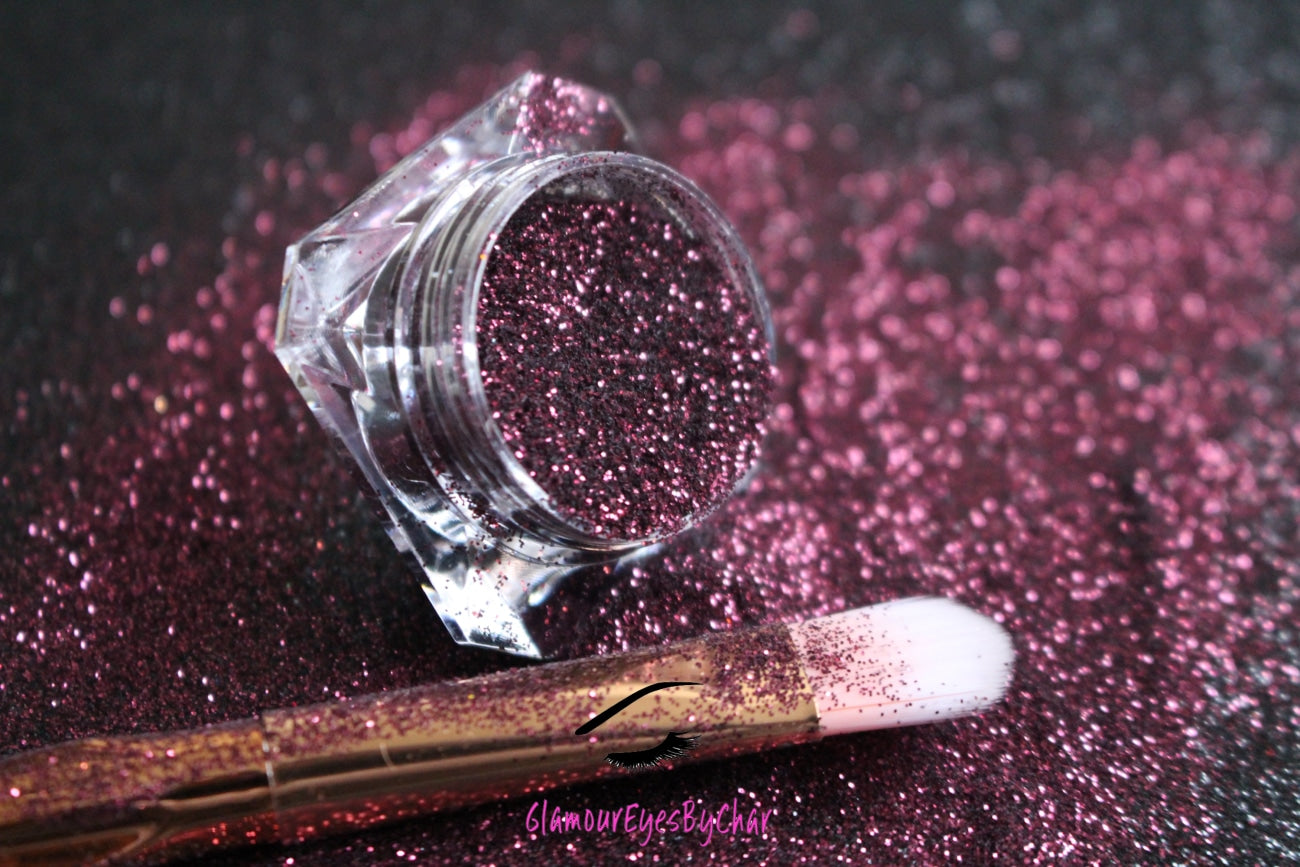 This glitter is called Merlot and is part of the simple glitter collection. It consists of deep burgundy metallic glitter.  Merlot can be used for your face, body, hair and nails.  Comes in 5g jars only.