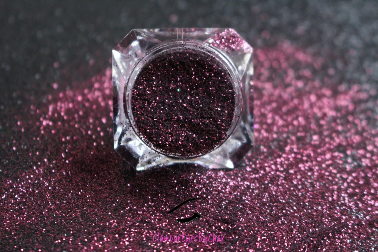 This glitter is called Merlot and is part of the simple glitter collection. It consists of deep burgundy metallic glitter.  Merlot can be used for your face, body, hair and nails.  Comes in 5g jars only.