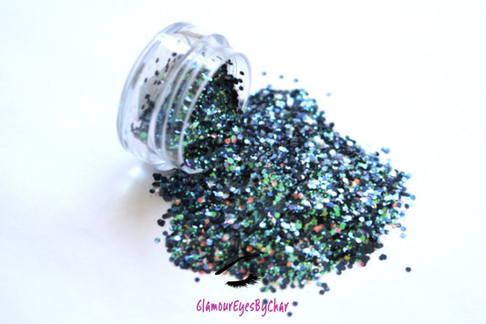 This glitter is called Mermaid Delight and is part of the chunky glitter collection.  It consists of navy blue glitter with a white iridescent sparkle. Mermaid Delight can be used for your face, body, hair and nails.  Comes in 5g jars only. **Glitter will be discontinued once sold out**