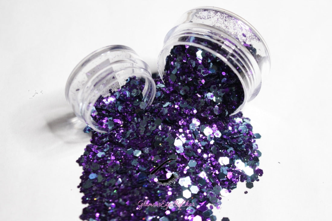 This glitter is called Midnight Purple and is part of the super chunky glitter collection.  It consists of royal purple and teal glitter with an eye catching sparkle. Midnight Purple can be used for your face, body, hair and nails.  Comes in 5g and 10g jars.