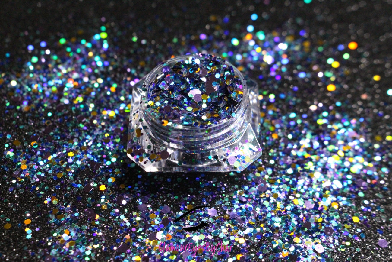 This glitter is called Milky Way and is part of the super chunky glitter collection.  It consists of lilac, teal, and gold glitter with a beautiful sparkle. Milky Way can be used for your face, body, hair and nails.
