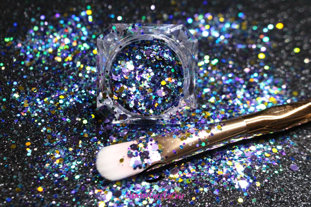 This glitter is called Milky Way and is part of the super chunky glitter collection.  It consists of lilac, teal, and gold glitter with a beautiful sparkle. Milky Way can be used for your face, body, hair and nails.