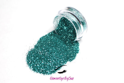 This glitter is called Paradise and is part of the simple glitter collection. It consists of metallic teal simple glitter. Paradise can be used for your face, body, hair and nails. Comes in 5g jars only. **Glitter will be discontinued once sold out**