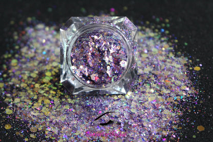 This glitter is called Pastel Vibes and is part of the super chunky glitter collection. It consists of purple glitter with a rose gold unique colour shifting sparkle. Pastel Vibes can be used for your face, hair, body and nail art, glitter slime, resin art or DIY projects.  Comes in 5g jars only.