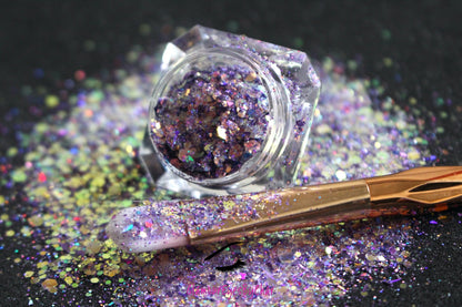 This glitter is called Pastel Vibes and is part of the super chunky glitter collection. It consists of purple glitter with a rose gold unique colour shifting sparkle. Pastel Vibes can be used for your face, hair, body and nail art, glitter slime, resin art or DIY projects.  Comes in 5g jars only.