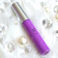 Empress is a gorgeous lavender hydrating gloss. This gloss is also vegan, gluten-free, high shine, smooth and long lasting. It's made with premium rich ingredients to keep your lips soft, moisturized and luscious without feeling sticky. Empress is available in a squeeze tube and a wand tube (doe foot applicator) for a more precise application.