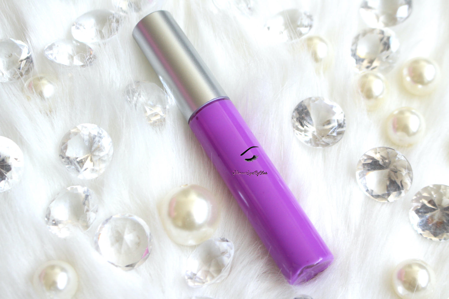Empress is a gorgeous lavender hydrating gloss. This gloss is also vegan, gluten-free, high shine, smooth and long lasting. It's made with premium rich ingredients to keep your lips soft, moisturized and luscious without feeling sticky. Empress is available in a squeeze tube and a wand tube (doe foot applicator) for a more precise application.