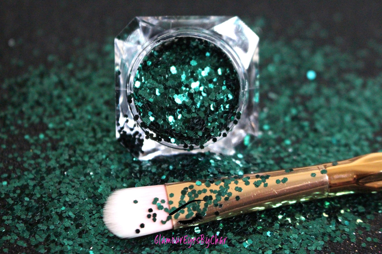 This glitter is called Pining For You and is part of the simple glitter collection.  It consists of pine green glitter. Flake size is larger than fine and extra fine glitter.Pining For You can be used for your face, body, hair and nails.