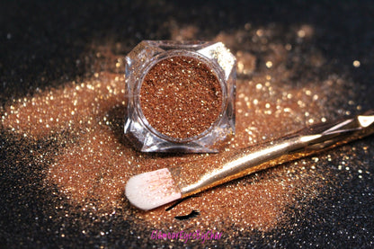 This glitter is called Rich Girl and is part of the simple glitter collection. It consists of light copper metallic glitter. Rich Girl can be used for your face, body, hair and nails. Comes in 5g jars only.