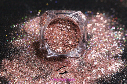 This glitter is called Rose Quartz and is part of the chunky glitter collection. It consists of rose pink glitter with a slight silver holographic sparkle. Rose Quartz can be used for your face, body, hair and nails.