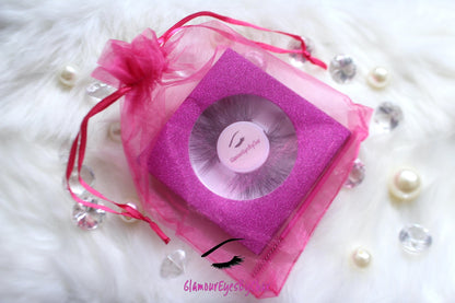 These 5D luxurious mink lashes are called Sassy and are 25mm in length. They are very dramatic, wispy, have a criss cross style, lightweight, and comfortable to wear on the lids. The thin lashband, makes the application process a breeze.  Sassy are suitable for dramatic eye looks and can be worn up to 25 times if handled with care. They are not for timid lash wearers.  Lashes come with a cute bag, and a mascara wand so that you can take care of these beauties.