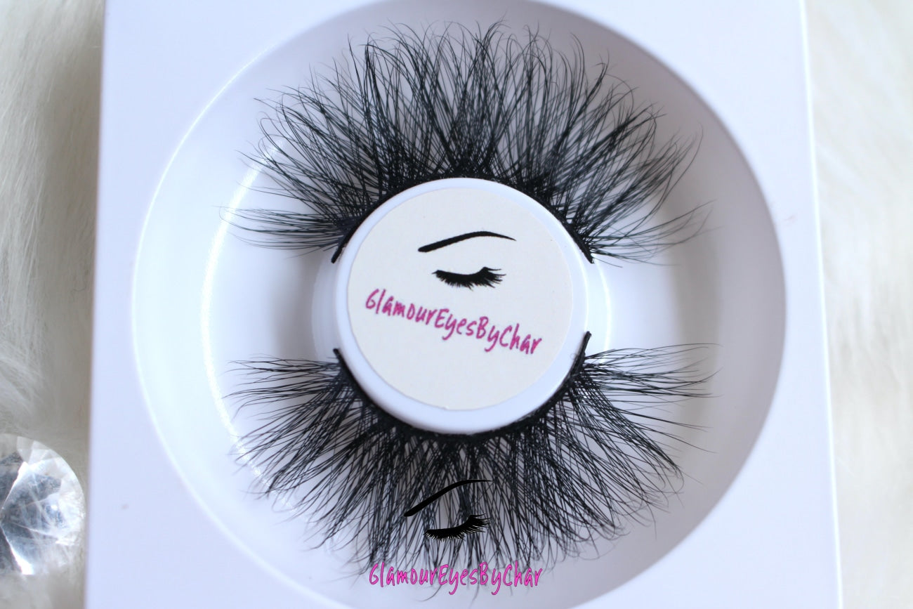 These 5D luxurious mink lashes are called Sassy and are 25mm in length. They are very dramatic, wispy, have a criss cross style, lightweight, and comfortable to wear on the lids. The thin lashband, makes the application process a breeze.  Sassy are suitable for dramatic eye looks and can be worn up to 25 times if handled with care. They are not for timid lash wearers.  Lashes come with a cute bag, and a mascara wand so that you can take care of these beauties.