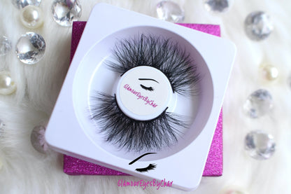 These 5D luxurious mink lashes are called Sassy and are 25mm in length. They are very dramatic, wispy, have a criss cross style, lightweight, and comfortable to wear on the lids. The thin lashband, makes the application process a breeze.  Sassy are suitable for dramatic eye looks and can be worn up to 25 times if handled with care. They are not for timid lash wearers.  Lashes come with a cute bag, and a mascara wand so that you can take care of these beauties.