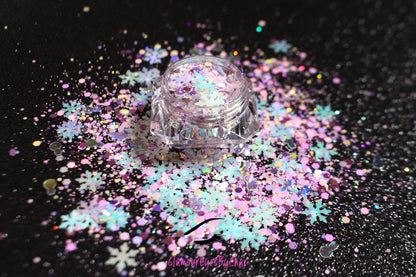 Snow Angels – Premium Light Iridescent Pink and Blue Snowflake Glitter Mix
Part of our Holiday Collection, this glitter consists of light iridescent pink and blue snowflakes with white, purple, and silver glitter. Snow Angels is perfect&nbsp;
for nail art and glitter slime.
Available in 5g jars only.