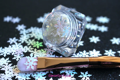 Snowflakes – Premium 9mm Iridescent Glitter Shapes
Part of our Holiday Collection, these delicate 9mm snowflakes shimmer in two enchanting iridescent colours. Perfect for adding a touch of cozy winter magic to your nail art and glitter slime.
Available in 5g jars only.