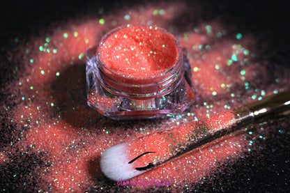 This glitter is called Sorbet and is part of the simple glitter collection. It consists of coral glitter with an iridescent sparkle. Sorbet can be used for your face, body, hair and nails. Comes in 5g jars only.