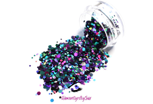 This glitter is called Spellbound and is part of the super chunky glitter collection.  It consists of royal purple and teal glitter with a holographic sparkle. Spellbound can be used for your face, body, hair and nails.  Comes in 5g jars only. **Glitter will be discontinued once sold out**