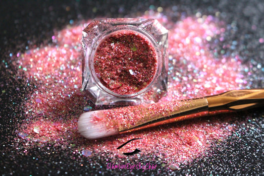 This glitter is called Tropical Sunset and is part of the super chunky glitter collection.  It consists of bright coral and fuchsia glitter with an iridescent sparkle. Tropical Sunset can be used for your face, body, hair and nails.  Comes in 5g jars only. **Glitter will be discontinued once sold out**