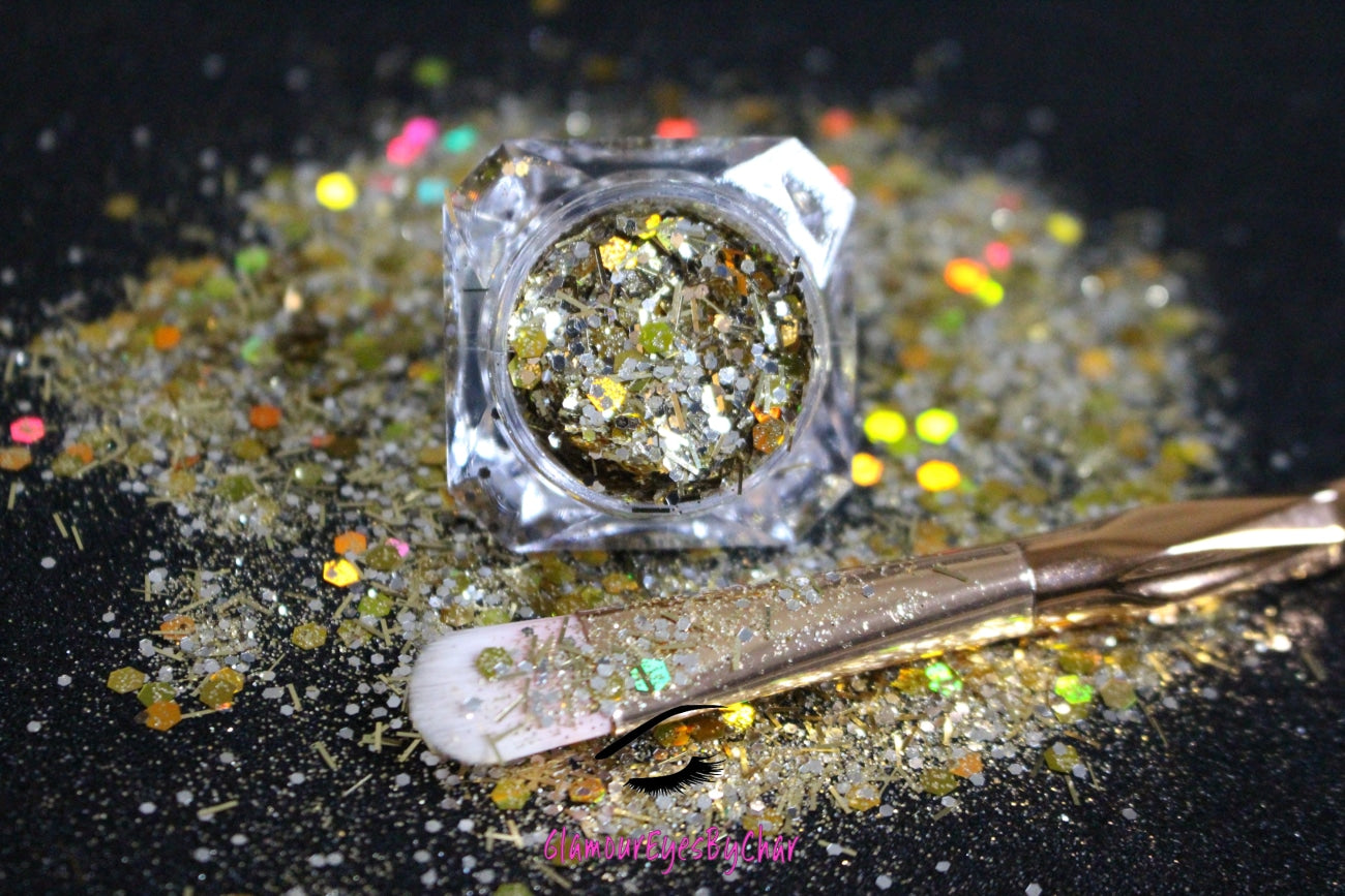 This glitter is called Twilight Zone and is part of the super chunky glitter collection.  It consists gold and silver glitter with a holographic sparkle. Twilight Zone can be used for your face, body, hair and nails.  Comes in 5g jars only. **Glitter will be discontinued once sold out**