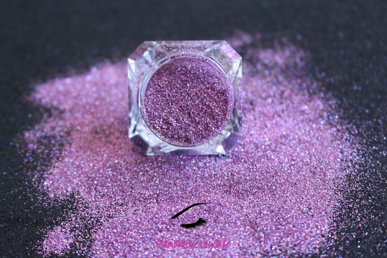 This glitter is called Va Va Violet and is part of the simple glitter collection. It consists of violet pink simple glitter with a holographic sparkle. Va Va Violet can be used for your face, body, hair and nails. Comes in 5g jars only